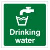 Drinking water self adhesive sign. Green background, white text and symbol