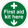 First Aid Kit Here - Safety Sign. 100mm diameter circle self adhesive, green background with white text and cross symbol